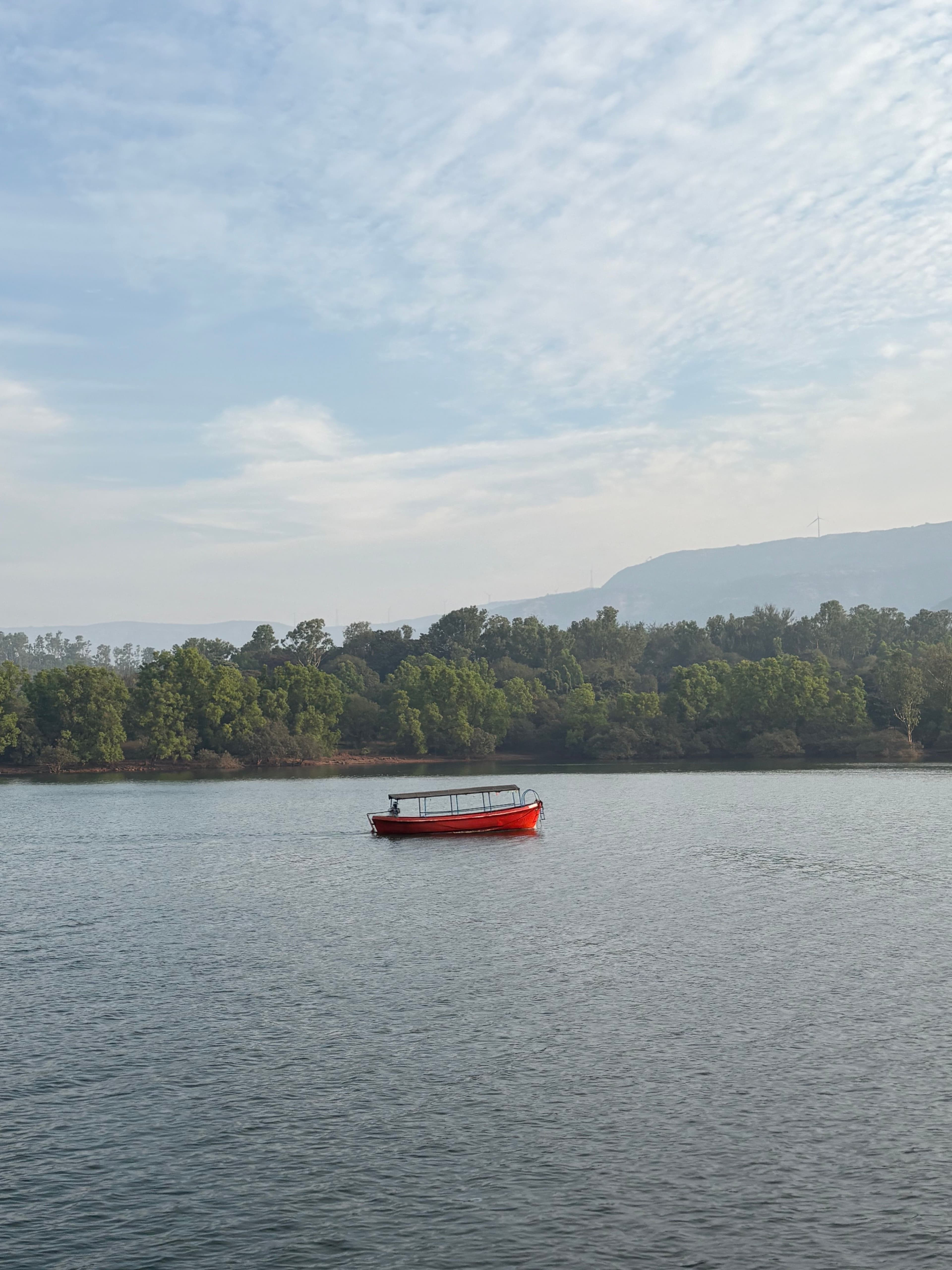 Green hills and reservoir backwaters at Tapola Mini Kashmir
